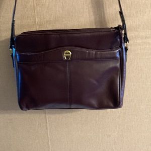 Womens shoulder bag. Never used. Small tear on handle easily repaired